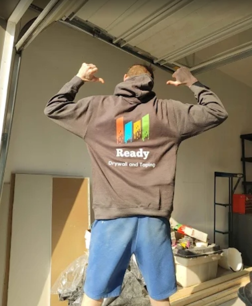 Restaurant staff wearing branded shirts