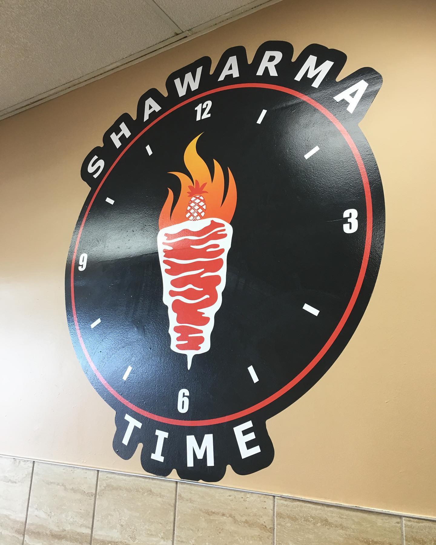 Restaurant staff wearing branded uniforms